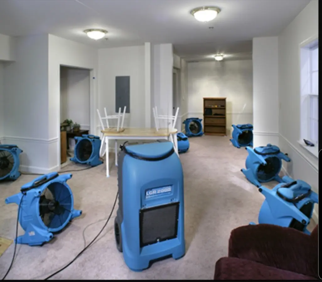 Air movers and dehumidifier setup for Water Damage Restoration in Whitefish